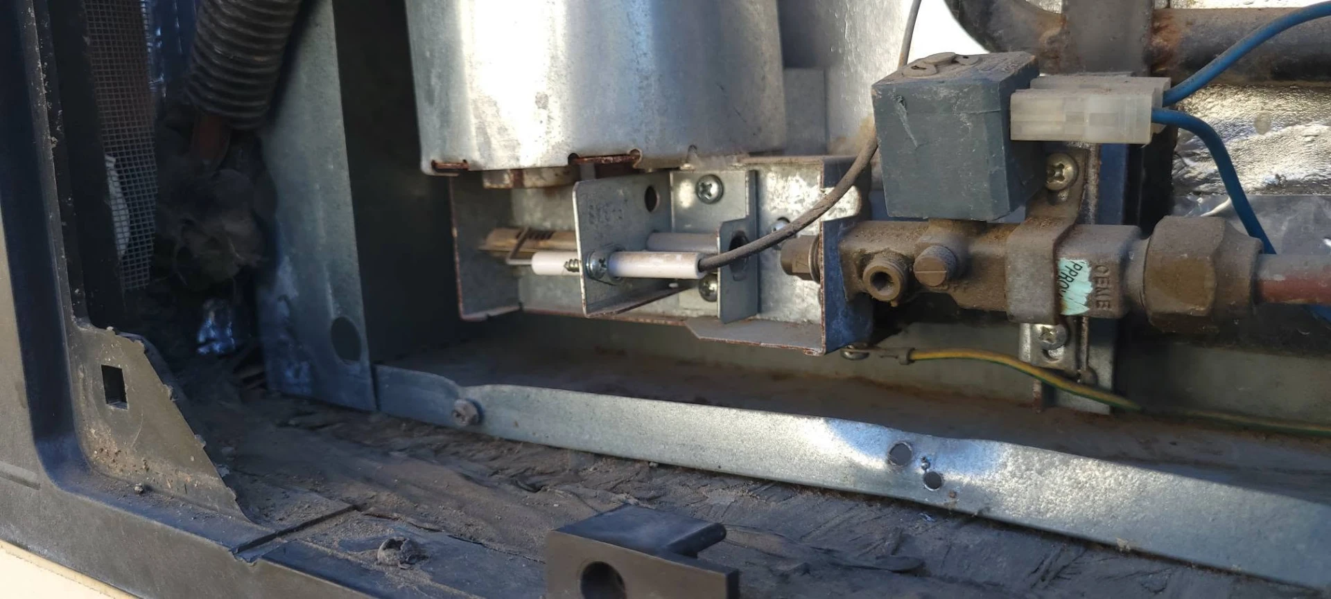 Water heater burner and valve service